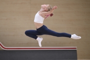 Young gymnast during training