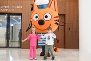 Guests of the Academy with a life-size puppet from the Three Cats cartoon