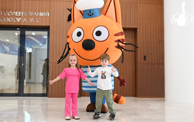 Guests of the Academy with a life-size puppet from the Three Cats cartoon