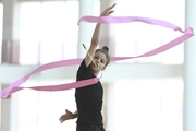 Karolina Tarasova during an exercise with a ribbon