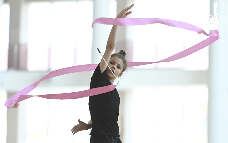 Karolina Tarasova during an exercise with a ribbon