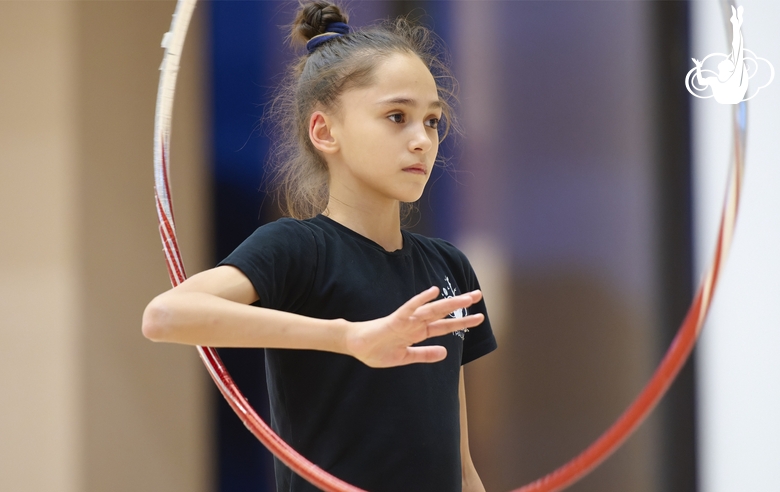 Valeria Medvedeva during exercise with a hoop