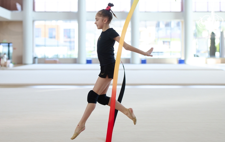 Ksenia Savinova during an exercise with a ribbon