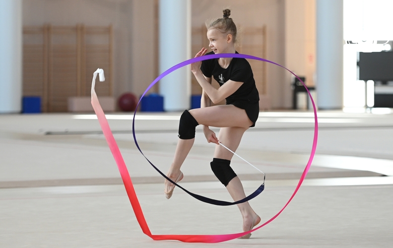 Kristina Voitenko during an exercise with a ribbon