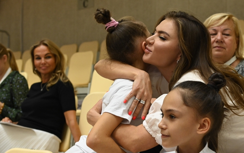 Olympic champion Alina Kabaeva with Academy gymnasts