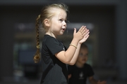 Young gymnast during training