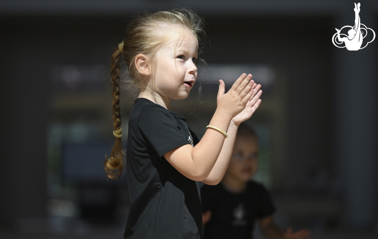 Young gymnast during training