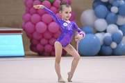 Young gymnast during an exercise with a jump rope at the mAlinka tournament