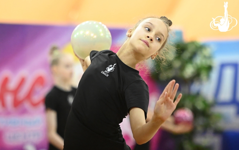 Miroslava Monina during an exercise with a ball  at floor testing