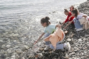 Gymnasts during a walk on the beach in Sochi