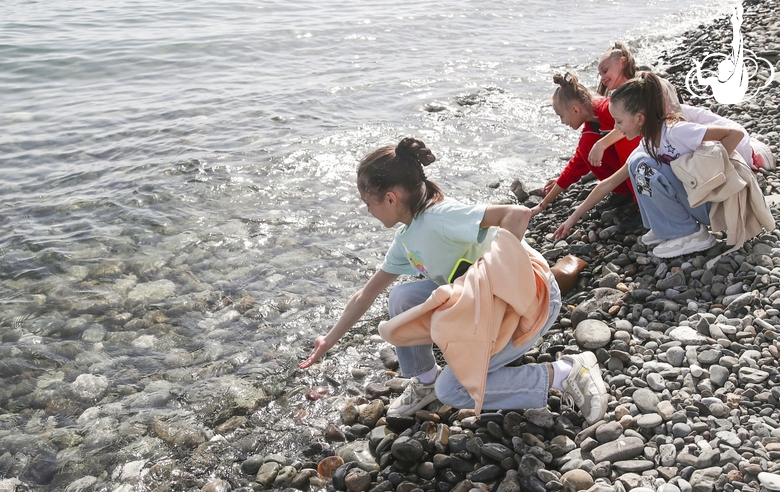 Gymnasts during a walk on the beach in Sochi