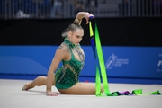 Natalia Usova during an exercise with a ribbon