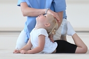 Young gymnast during training