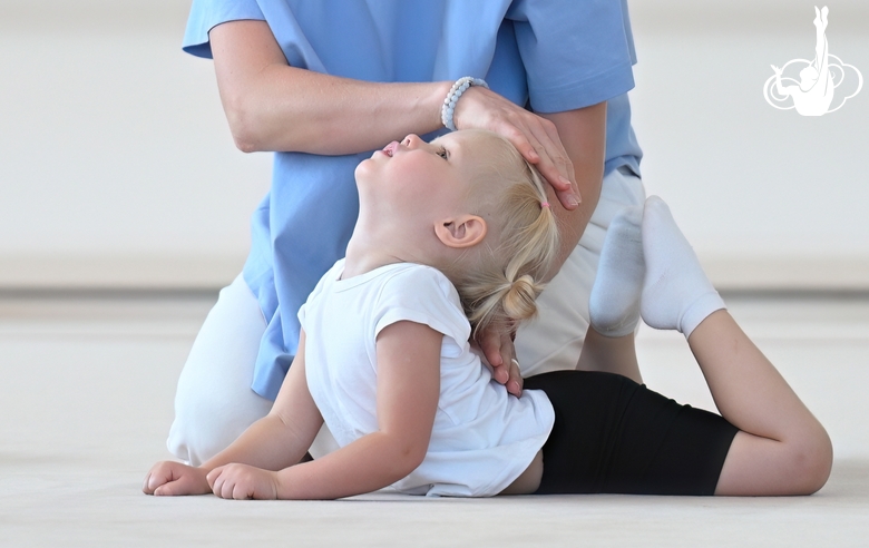 Young gymnast during training