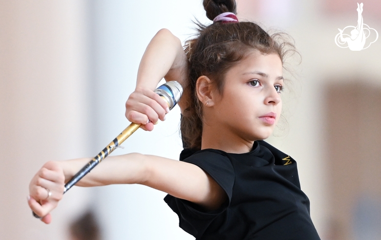 Karolina Tarasova during an exercise with clubs