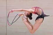 Gymnast during an exercise with a jump rope