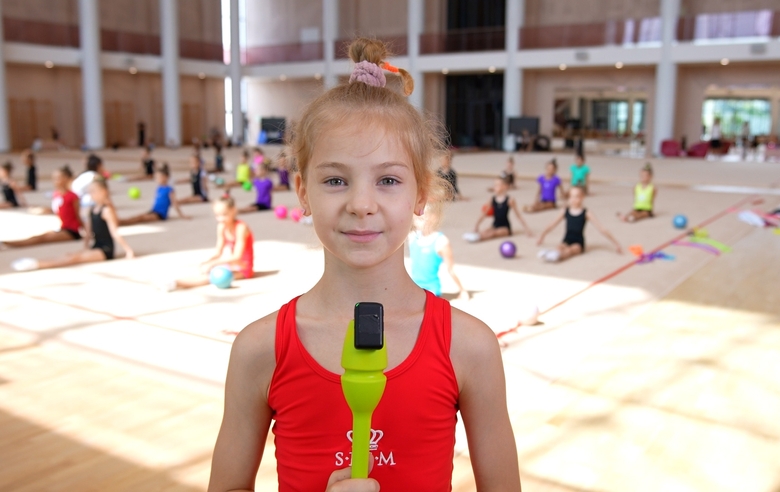 From which cities did the gymnasts come to the training camp at the Academy?