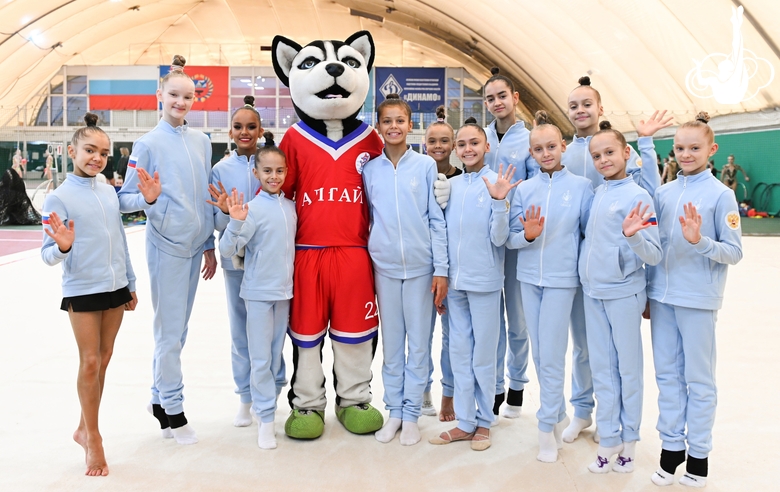 Academy students with the competition mascot