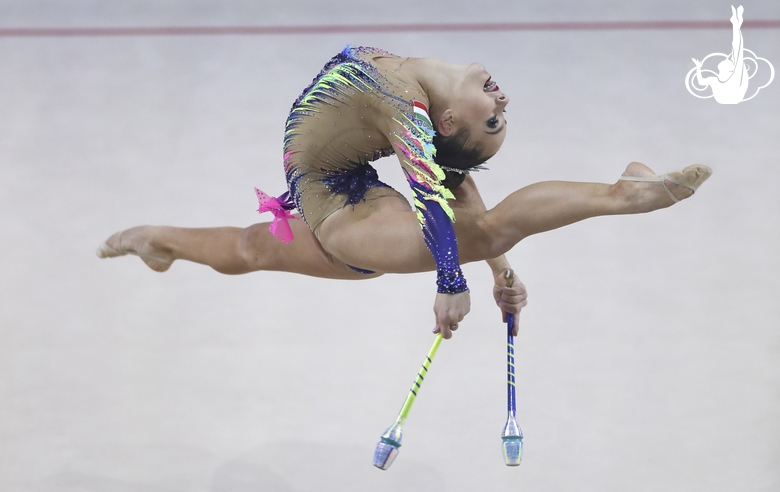 Sofia Bernat (Hungary) during an exercise with clubs