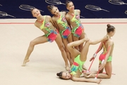 Gymnasts during an exercise with clubs