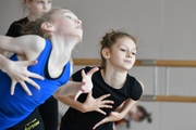 Gymnasts during class at the Academy choreography hall