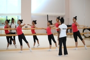 Coach Pooja Surve and gymnasts during choreography
