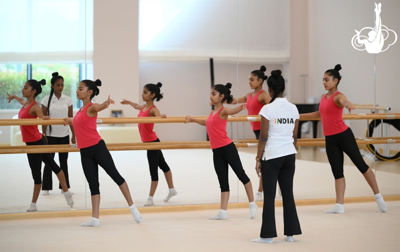 Coach Pooja Surve and gymnasts during choreography