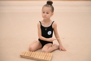 A young gymnast during a rhythmic gymnastics class