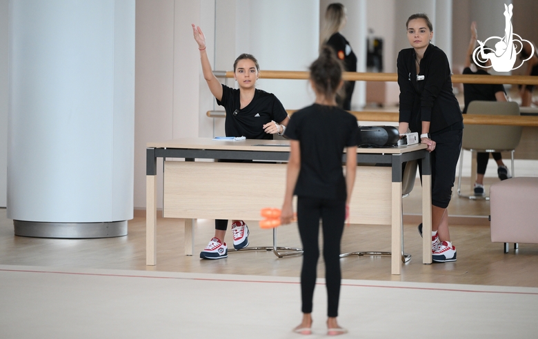 Dina and Arina Averina with Sabina Samatova during training at the Academy