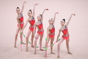 Gymnasts during an exercise with clubs