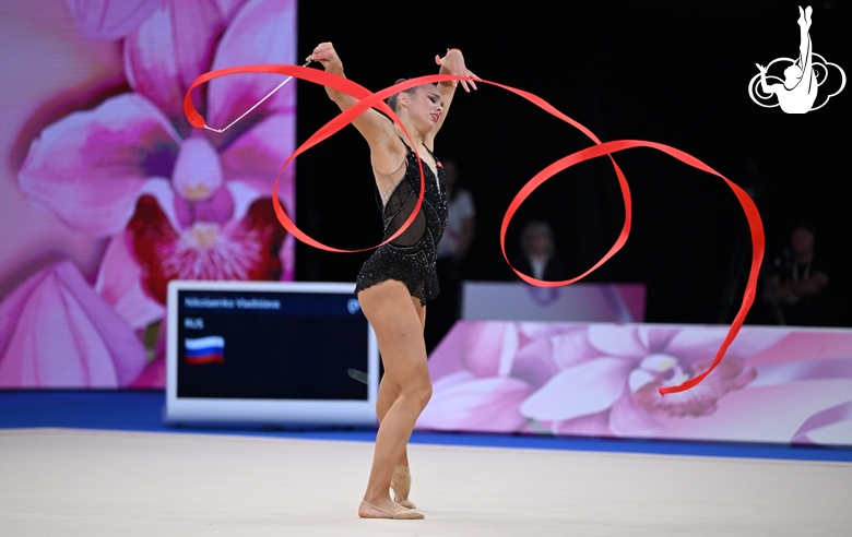 Vladislava Nikolaenko during an exercise with clubs