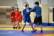 Participants of the training camp during training at the Martial Arts Academy