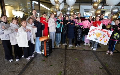 How were the Academy's group gymnasts congratulated on winning the Russian Championship?