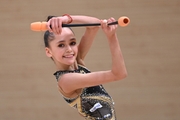 Valeria Medvedeva during an exercise with clubs at a control training session