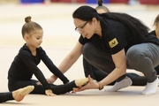 Academy Coach Alla Mishenina with young gymnasts during the workout