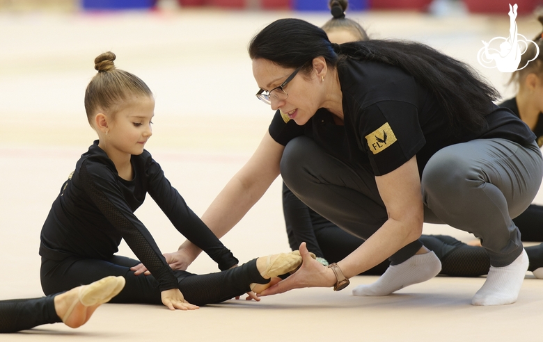 Academy Coach Alla Mishenina with young gymnasts during the workout