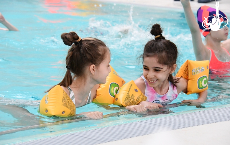 Gymnasts in the Academy pool