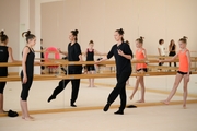 Gymnasts and choreographer Vera Arbuzova at a training session during the recovery camp at the Academy