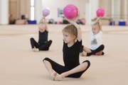 Young gymnasts during training