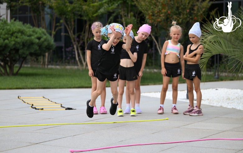 Young gymnasts during outdoor training