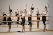 Gymnasts practice choreography during the recovery camp at the Academy