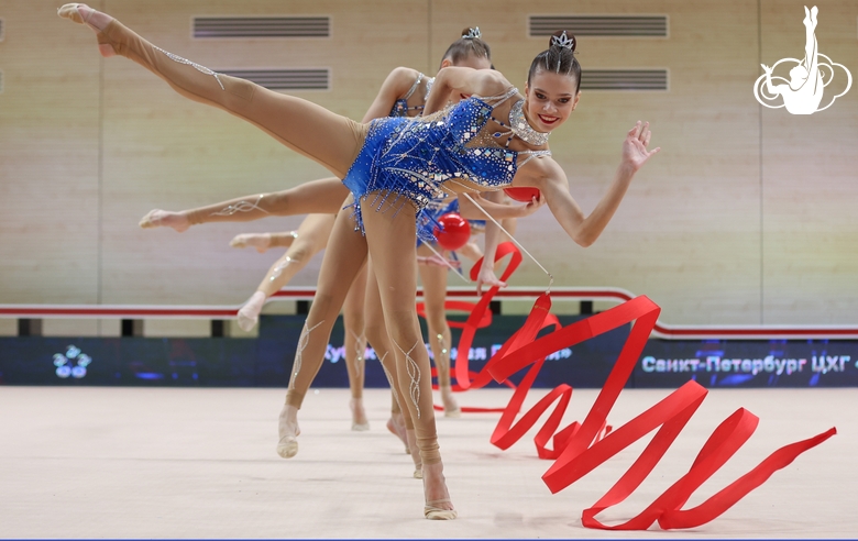 Gymnasts during an exercise with balls and ribbons