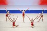 Group exercise gymnasts during the exercise with clubs