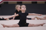 Young gymnast during training