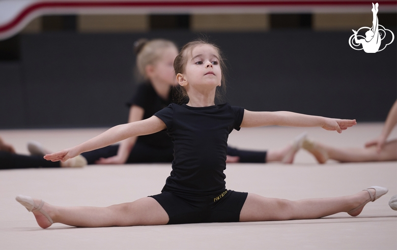 Young gymnast during training