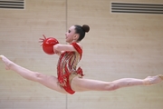 Gymnast during an exercise with a ball