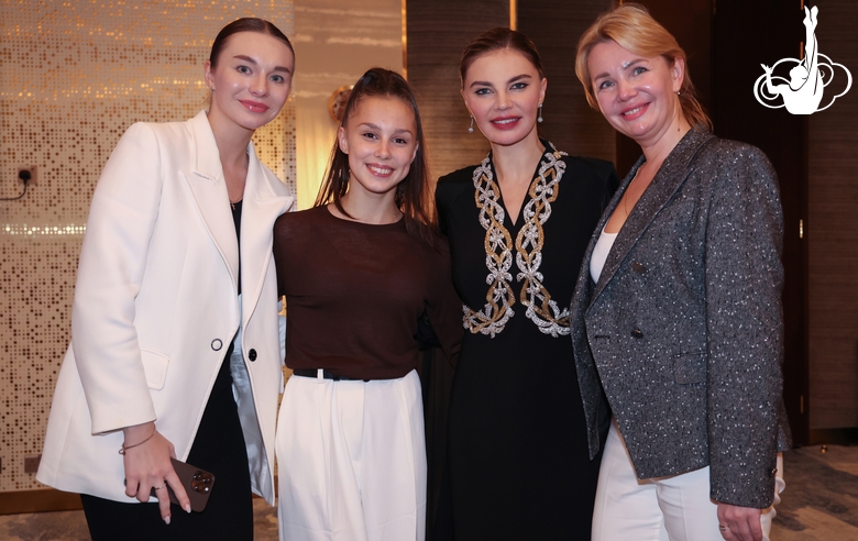 Olympic champion Alina Kabaeva, Academy coach Alina Gusarova, Mariia Borisova and Academy coach Irina Gusarova after the awards ceremony of the international Sky Grace Cup tournament in Doha