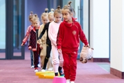 Young gymnasts during class