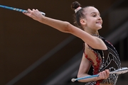 Miroslava Monina during an exercise with clubs at a control training session