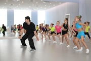 Choreographer Artur Nureev with gymnasts during practice at the training camp in the Academy